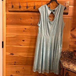 Teal colored sleeveless dress. Woman’s size 3x.